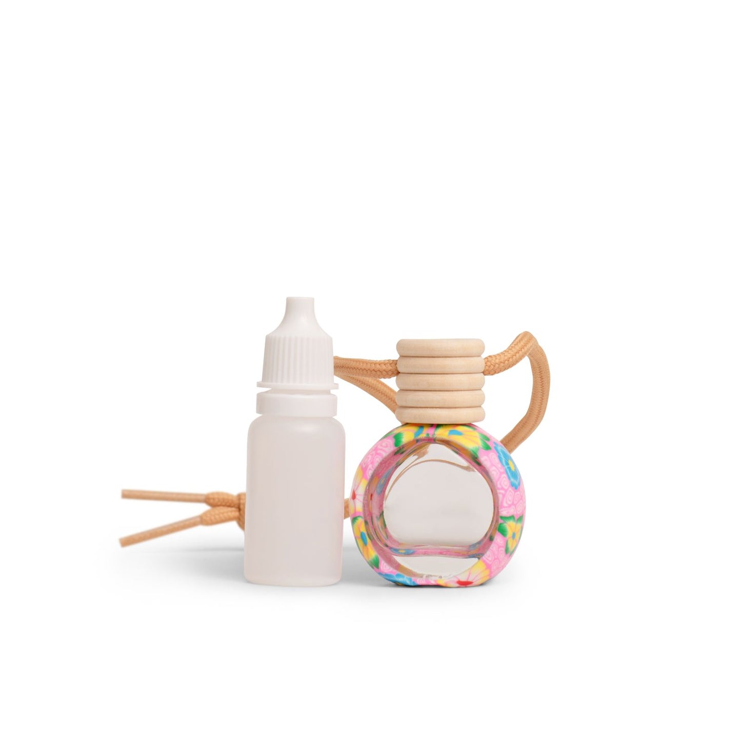 A 10ml refill bottle with a colorful label and a wooden cap, accompanied by a flexible nozzle.